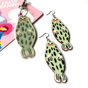 Norppa the Ringed Seal earrings + reflector + a post card